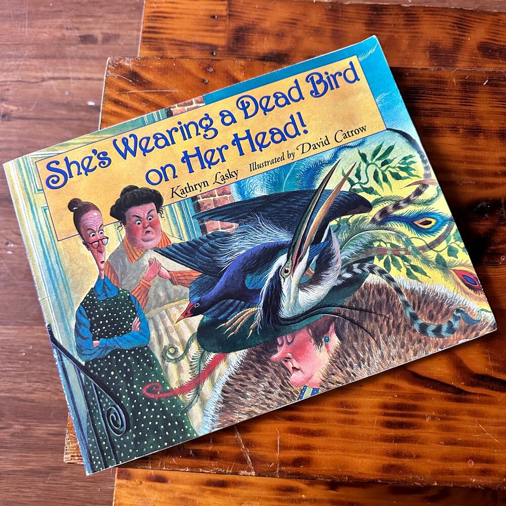 Vintage 1995 She's Wearing A Dead Bird On Her Head! Paperback Book
